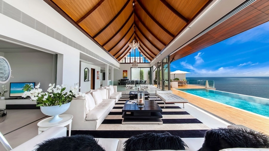 open interior with the infinity pool and the ocean view from villa Paradiso in Naithon Beach in Phuket Thailand